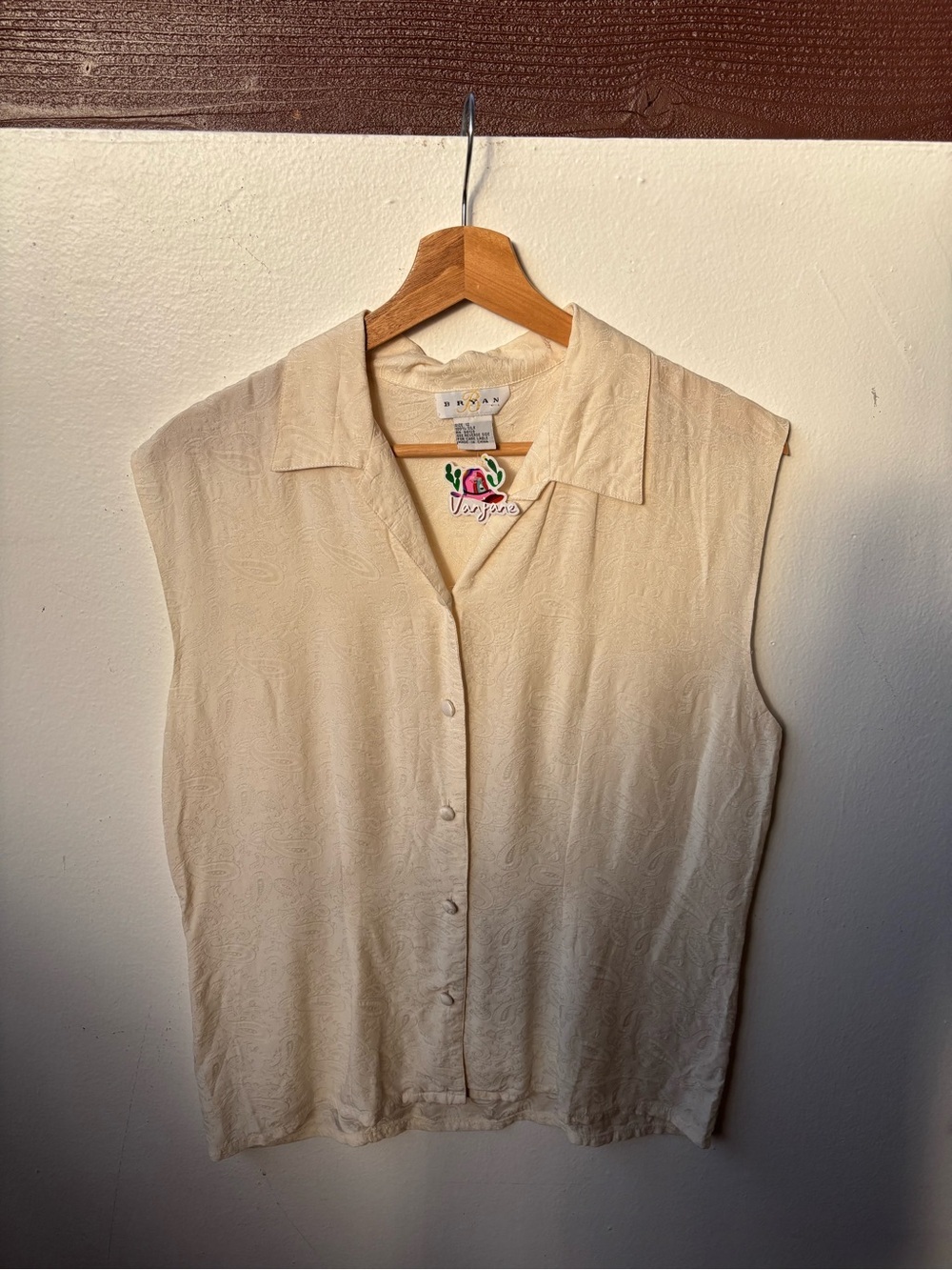Bryan silk Cream Sleeveless Button-Up Blouse